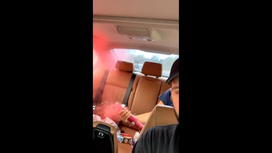 Pink smoke fills car interior after surprise pop in Denver, Colorado, USA