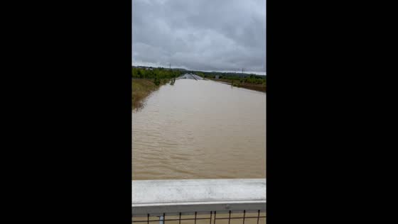 Road completely submerged after flood in Bedford, UK