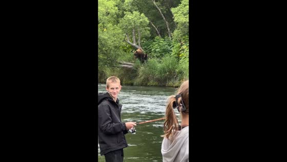 Bear with cub spotted by fishermen in Kamchatka, Russia