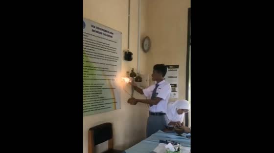 A student's DIY lamp explodes in an Indonesian classroom