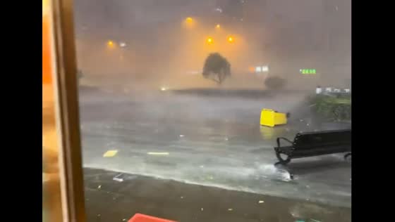 Heavy rain, wind, and hail sweep through street in Guizhou, China
