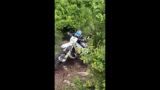 Rider slides down steep trail after losing balance in Ambato, Ecuador