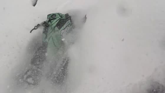 Sled falls into creek during ride in Prince George, Canada