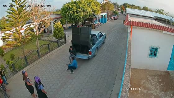 Man falls while trying to sit on pickup during parade in Guatemala