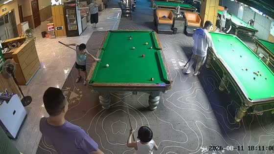 Boy impresses onlookers with billiards skills in Sichuan, China