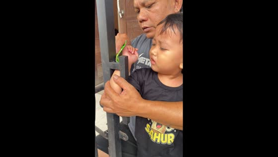 Toddler’s hand freed from fence railing in Magelang, Java, Indonesia