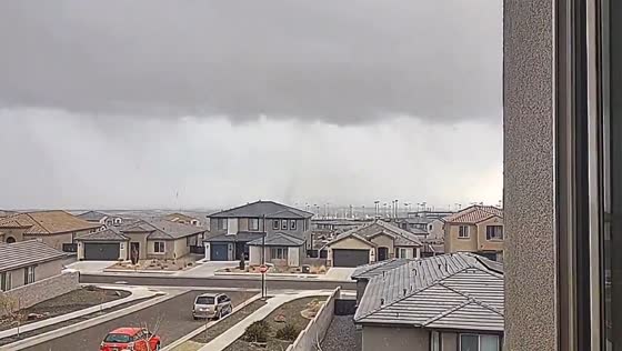 Rare landspout tornado forms during snowfall in Albuquerque, New Mexico, USA
