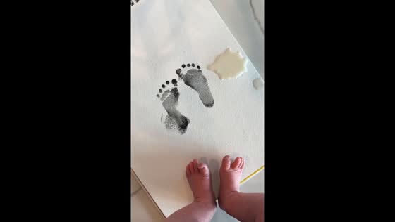 Parent captures baby’s footprint amid unexpected milk spill