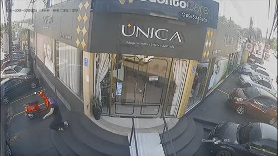 Woman stumbles while exiting salon in Ciudad del Este, Paraguay