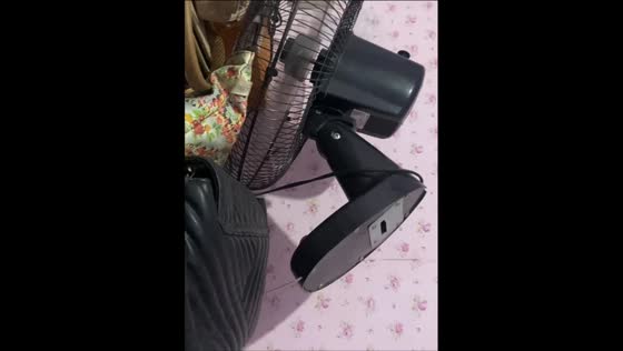 Wall fan moves in reverse in Pasig, Philippines