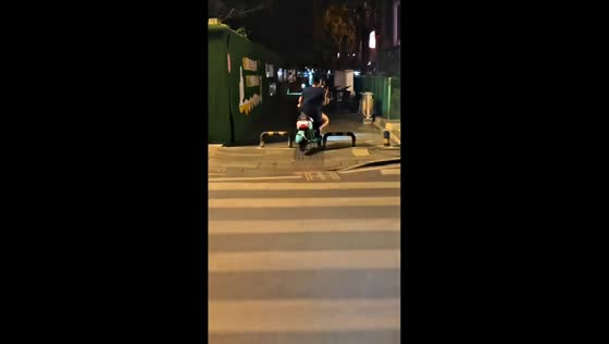 E-scooter riders trip over parking barrier during night ride in Sichuan, China