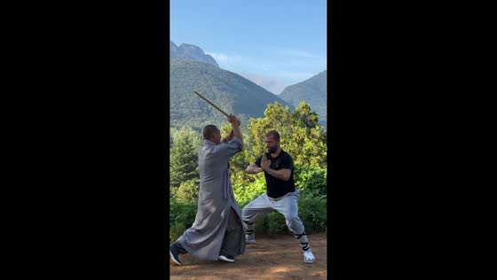 Martial arts trainee demonstrates “Iron Head” training near Shaolin Temple in Dengfeng, China