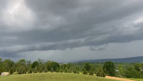 Shelf cloud moves across landscape during storm in New Tripoli, Pennsylvania, USA