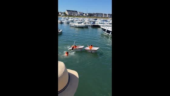Bathtub rafts nearly collide during sea adventure in Sarzeau, France