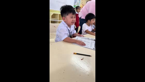 Little boy cries not wanting to write in Pampanga, Philippines