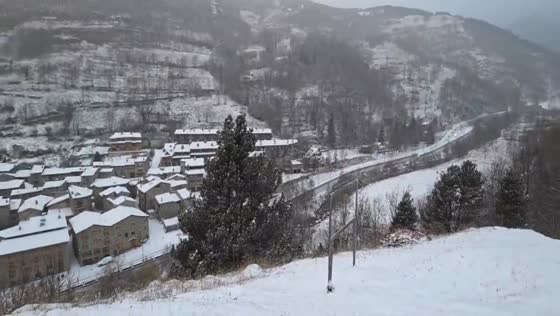 Thick morning snowfall transforms Setcases into a winter landscape in Girona, Spain
