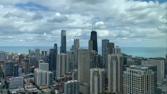 Timelapse of moving clouds and glowing skies over downtown Chicago, Illinois, USA