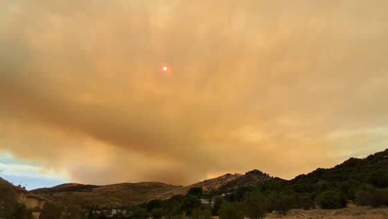 Wildfire smoke casts eerie sky over Cebreros, Ávila, Spain