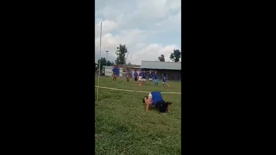 Girl takes a tumble while jumping over stick at Oei Tiong Ham Park, Singapore