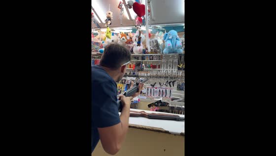 Inflorescent light tube shatters after being shot in Córdoba, Spain