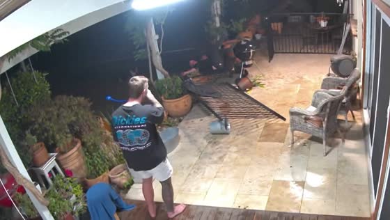 Person falls after losing balance in security camera footage