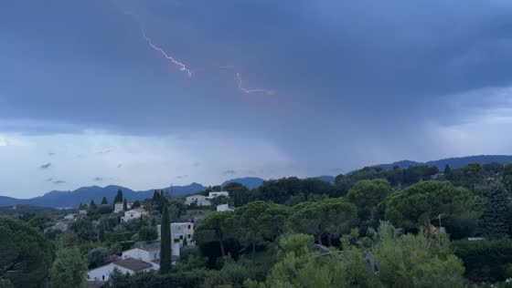Series of lightning bolts illuminate stormy sky over Mougins, France