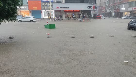 Typhoon Saudel flooding submerges vehicles and streets in Fujian, China