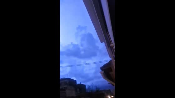 Glowing sky as storm approaches in Valencia, Spain