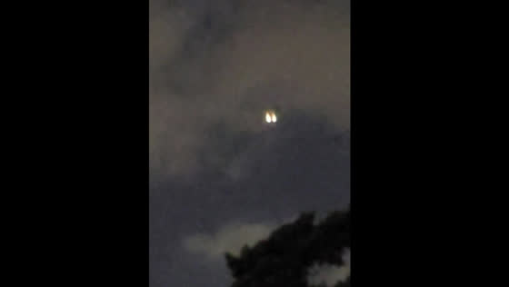 The girl noticed strange lights in the night sky. UFO?