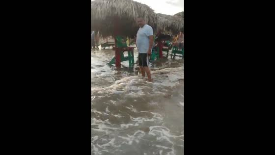 Ocean flooding with high waves at Delfines Playa Miramar in Mexico