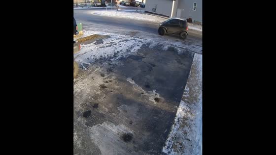 Smart car lift: unique driveway parking maneuver in Fort McMurray
