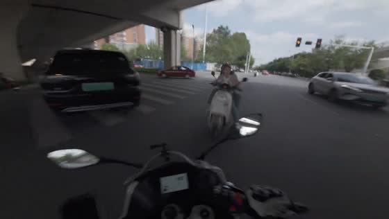 Motorcycle collision at intersection in Xinyang, Henan, China