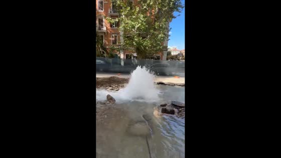 High-pressure water main bursts and floods Viale delle Milizie in Rome, Italy