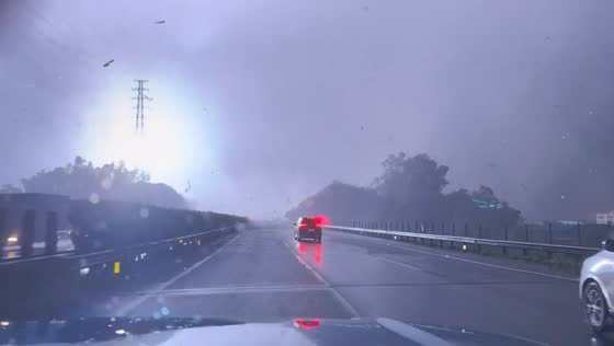 Tornado triggers sparks from high voltage power pole in Guangzhou