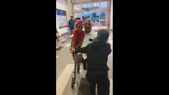 Man in wheelchair falls while playing with child in Higuey, Dominican Republic
