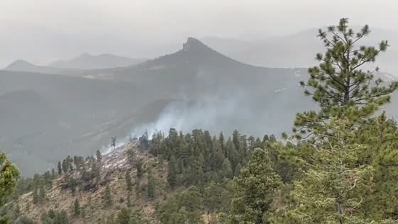 Lightning-sparked wildfire burns near White Hawk Trail in Jefferson, Colorado, USA