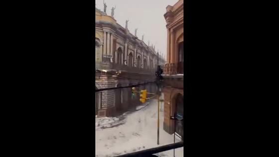 Rain and melting snow flow through the streets near Casa Dorada, Tarija, Bolivia