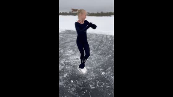9-year-old Anna Shaporenko's mesmerizing ice skating spin on Raduzny's frozen lake