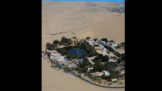 Village built around a small oasis and surrounded by sand dunes in Huacachina, Peru