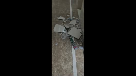 Elevator mishap as wall tiles collapse in Guangdong, China