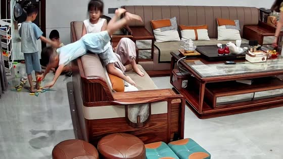 Boy falls from sofa while playing with children in Jiangxi, China
