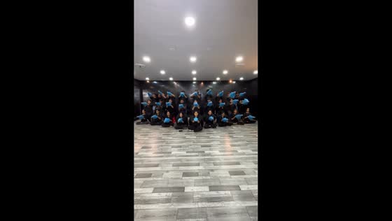 Group performs synchronized umbrella dance in Kolkata, India