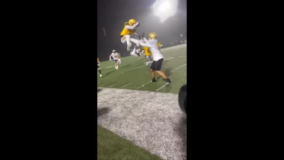 Football senior night captures daring hurdle attempt in Fairfield, California, USA