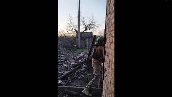 Ukrainian soldiers defend amidst conflict: battle for survival in abandoned Donetsk house