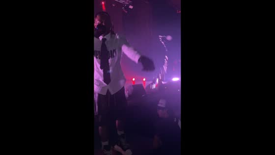 Singer accidentally spills water on audience during concert in Santiago, Chile