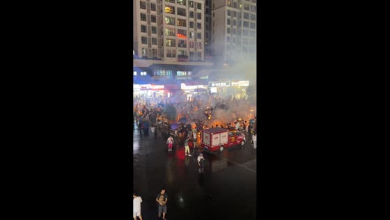 Crowds gather with glowing torches for Zhongyuan Festival in Guizhou, China