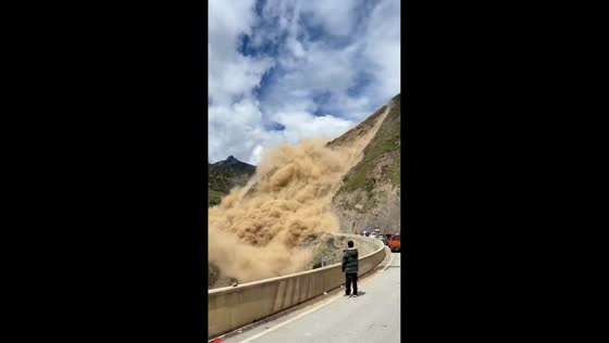 Massive landslide buries sections of National Highway G227 in Sichuan, China