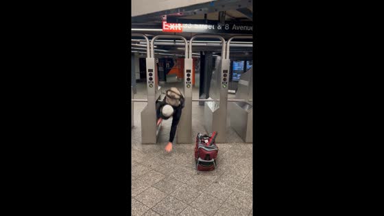 Man fails to clear subway turnstile and falls in New York City, New York, USA