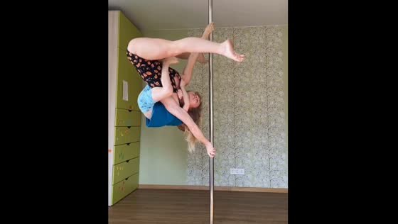 Pole dancing duo: Irpin coach balances strength and bond with 7-year-old son on back
