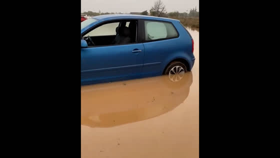 Flooding in Valencia, Spain, leaves vehicles submerged
